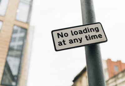 no loading at any time sign